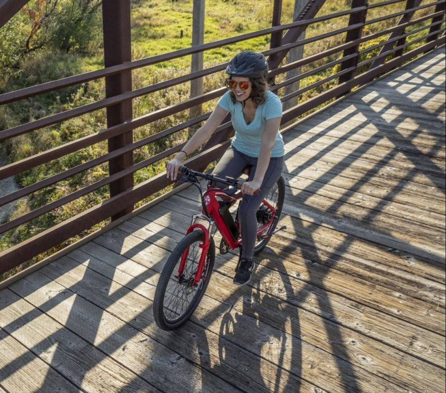 Woman Riding a Tuoteg XPLR Bike